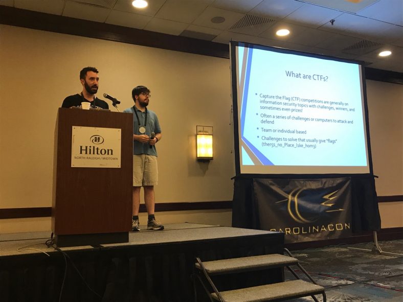 Clayton and Ray presenting about CTFs at CarlinaCon 13